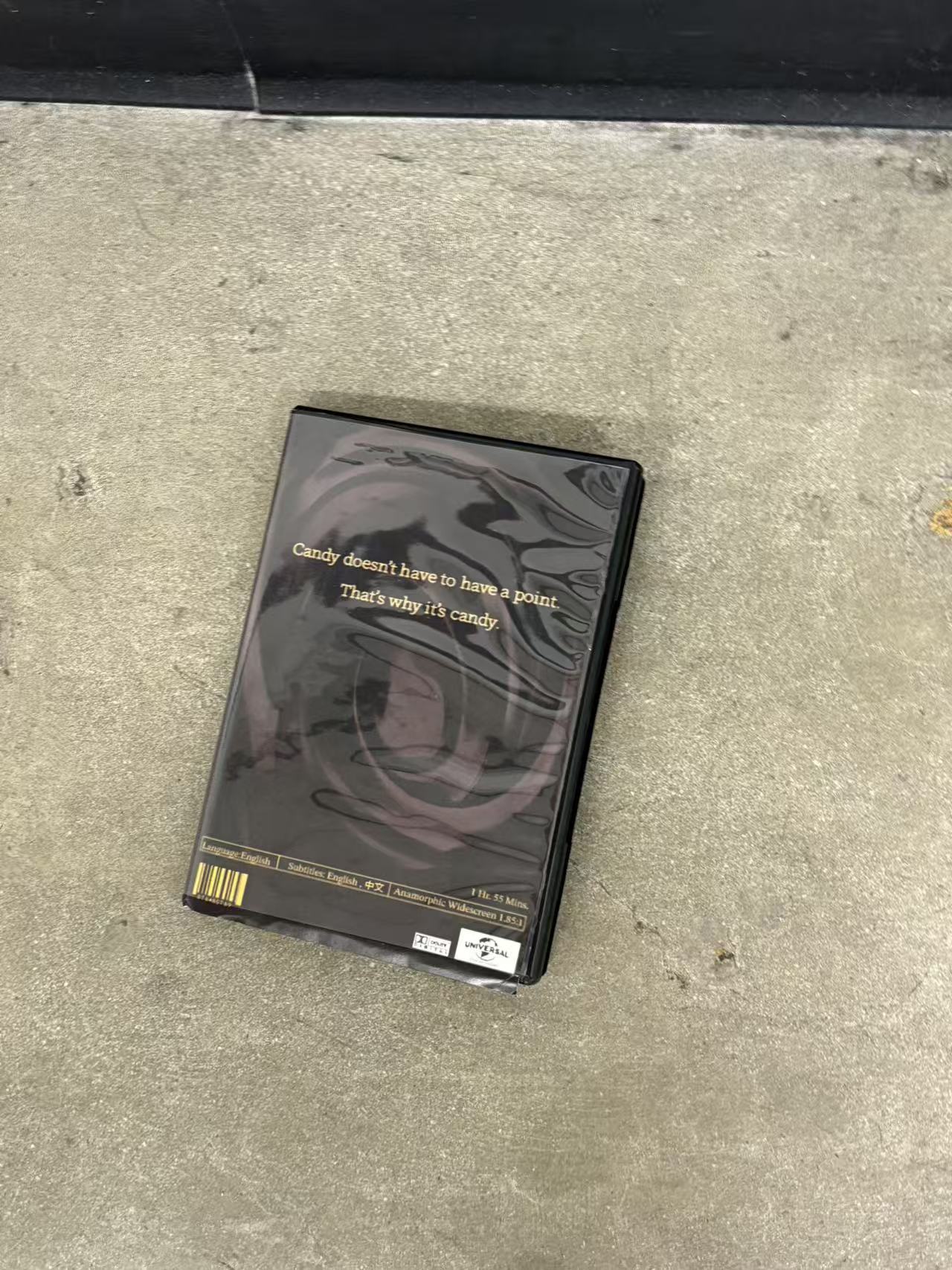 DVD case lying open, contents partially exposed